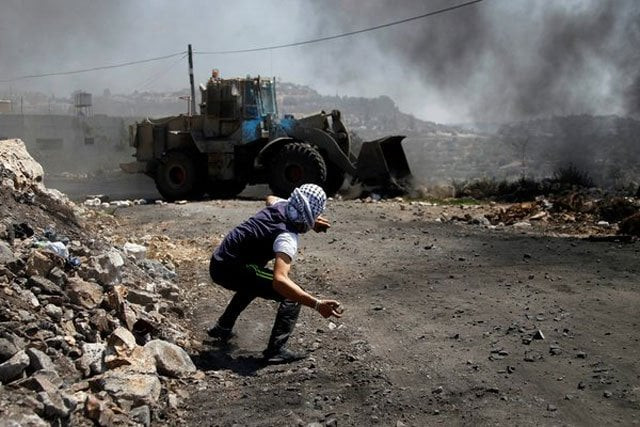 a palestinian man protesting israeli settlements in the west bank photo alaa badarneh european pressphoto agency a palestinian man protesting israeli settlements in the west bank photo alaa badarneh european pressphoto agency