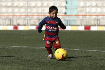 afghan boy dons messi s barcelona jersey afghan boy dons messi s barcelona jersey