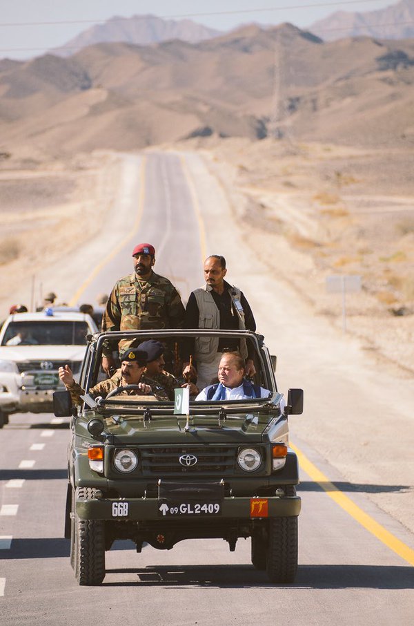 coas raheel sharif is seen driving pm nawaz sharif on the newly constructed patch of cpec photo ispr