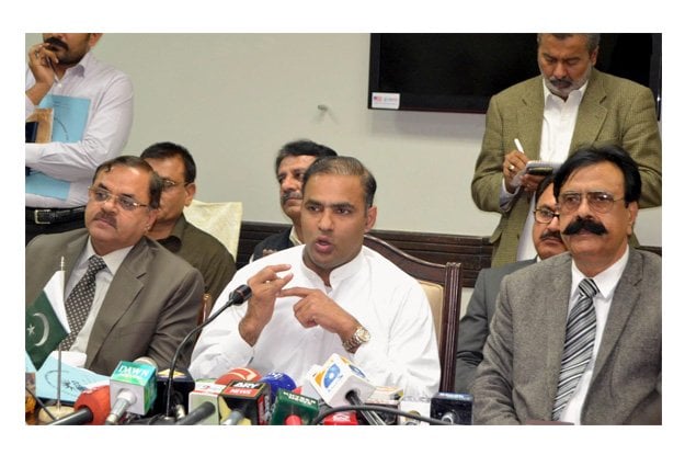 water and power minister abid sher ali addressing a press conference at hesco office photo inp