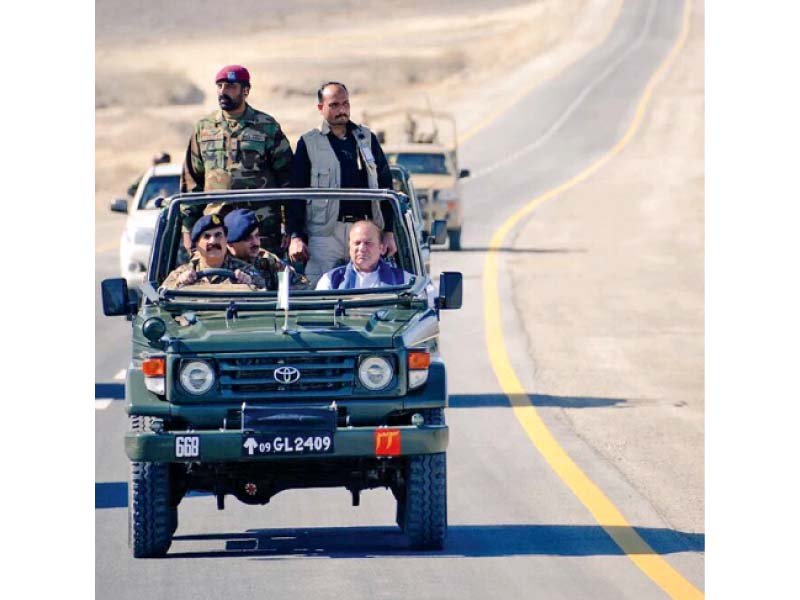 army chief gen raheel drives pm nawaz in a military jeep on the m 8 highway after its inauguration photo inp