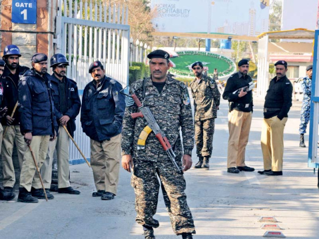 police stand alert outside the rawalpindi airport during a protest by pia employees photo zafar aslam express police stand alert outside the rawalpindi airport during a protest by pia employees photo zafar aslam express