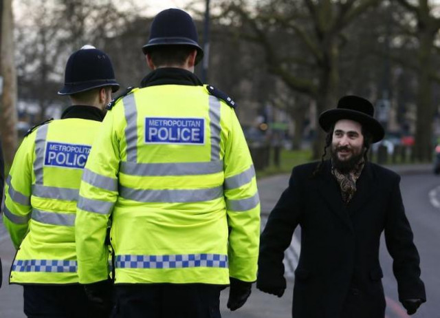 a member of the jewish community walks in north london january 20 2015 photo reuters a member of the jewish community walks in north london january 20 2015 photo reuters