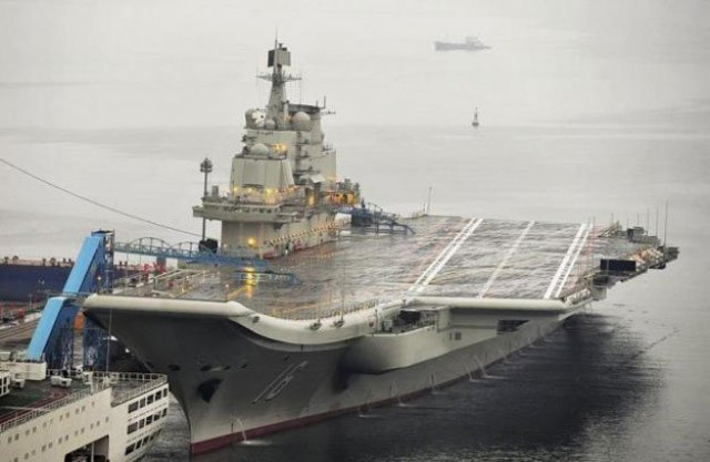 china 039 s first aircraft carrier which was renovated from an old aircraft carrier that china bought from ukraine in 1998 is seen docked at dalian port in dalian liaoning province september 22 2012 reuters china 039 s first aircraft carrier which was renovated from an old aircraft carrier that china bought from ukraine in 1998 is seen docked at dalian port in dalian liaoning province september 22 2012 reuters