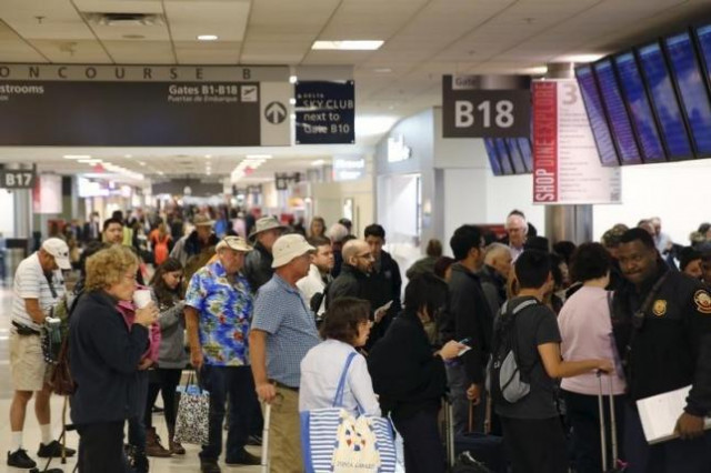 passengers board their flight at hartsfield jackson atlanta international airport in atlanta georgia november 23 2015 photo reuters passengers board their flight at hartsfield jackson atlanta international airport in atlanta georgia november 23 2015 photo reuters