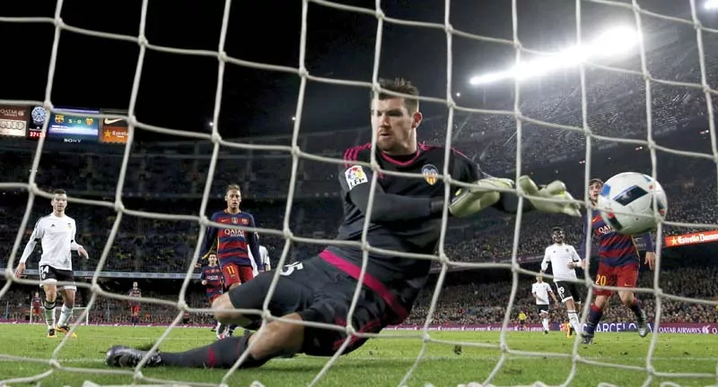valencia keeper ryan s busiest moments were those when he picked the ball from the back of the net after barcelona ran riot to slot seven past the helpless australian photo reuters valencia keeper ryan s busiest moments were those when he picked the ball from the back of the net after barcelona ran riot to slot seven past the helpless australian photo reuters