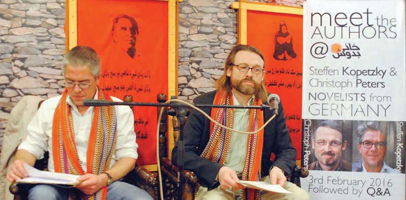 german fiction writers steffen kopetzky left and christoph peters right spoke about world war i at cafe khanabadosh on wednesday photo express