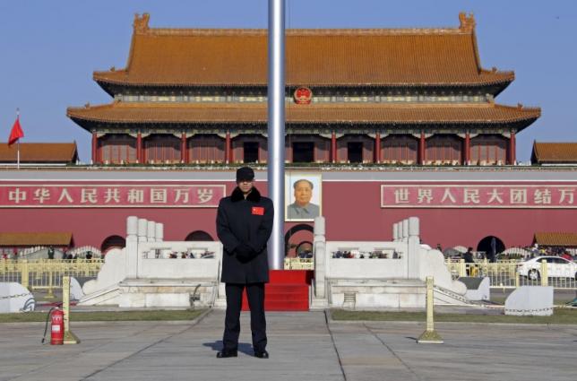 a security guard keeps watch at tiananmen square in beijing december 10 2015 photo reuters