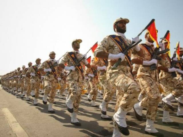 members of the iranian revolutionary guard march during a parade to commemorate the anniversary of the iran iraq war 1980 88 in tehran september 22 2011 photo reuters