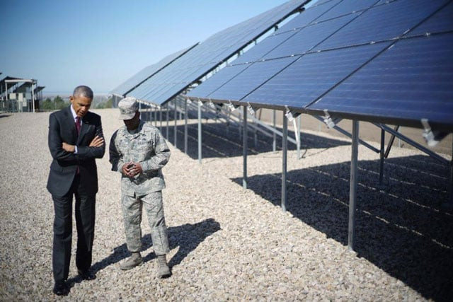 barack obama speaks with commander col ronald jolly as he visits a solar array at hill air force base in utah on april 3 2014 photo afp barack obama speaks with commander col ronald jolly as he visits a solar array at hill air force base in utah on april 3 2014 photo afp