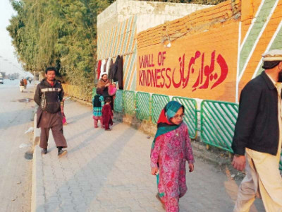 the wall of kindness pavement goes from sex corner to charity spot