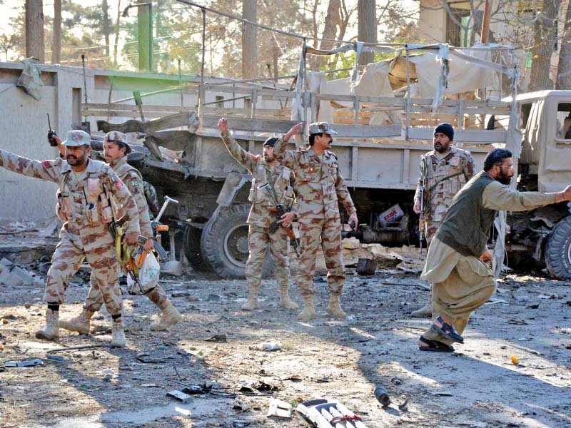 paramilitary soldiers call out for rescue volunteers after the bombing in quetta photo afp
