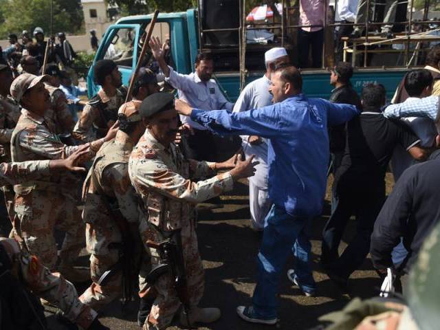 rangers baton charge on employees of pakistan international airlines pia during a protest near karachi international airport in karachi on february 2 2016 photo afp