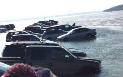cars parked on thin ice get icy bath in wisconsin