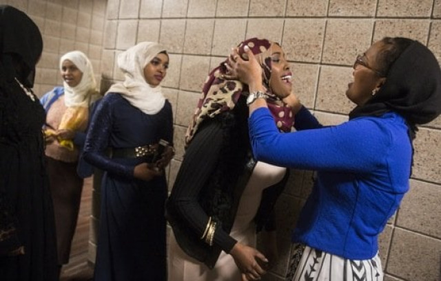 from right augsburg students aisha barre 19 and anisa ahmed 18 primped backstage before wednesday s hijab fashion show photo startribune from right augsburg students aisha barre 19 and anisa ahmed 18 primped backstage before wednesday s hijab fashion show photo startribune
