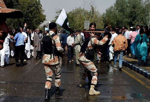 rangers personnel baton charge on employees of pakistan international airlines pia during a protest near jinnah international airport in karachi on february 2 2016 photo afp