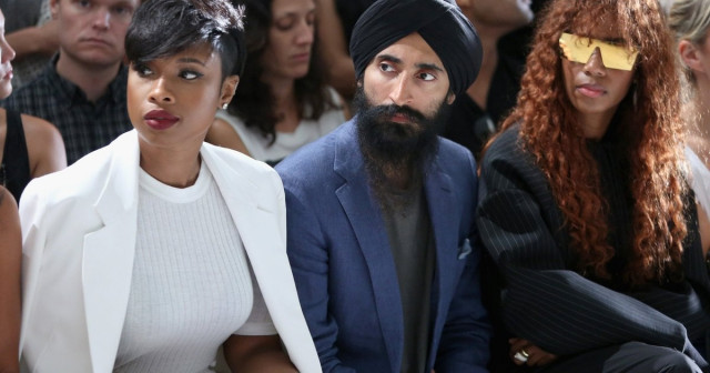 actor waris ahluwalia left and santigold attend dkny women s spring 2016 during new york fashion week photo afp actor waris ahluwalia left and santigold attend dkny women s spring 2016 during new york fashion week photo afp