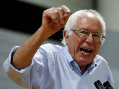 sanders sneaks ahead as first votes cast in new hampshire sanders sneaks ahead as first votes cast in new hampshire