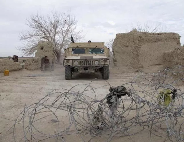 an afghan national army ana vehicle is seen parked at an outpost in helmand province afghanistan december 25 2015 photo reuters an afghan national army ana vehicle is seen parked at an outpost in helmand province afghanistan december 25 2015 photo reuters