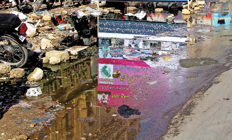 protesters held a gutter fashion show last week protesting the government s lack of action about the over flowing gutters in the city photo aysha saleem express