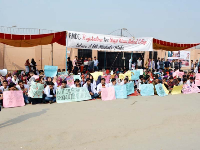 students protesting in front of the college photo express