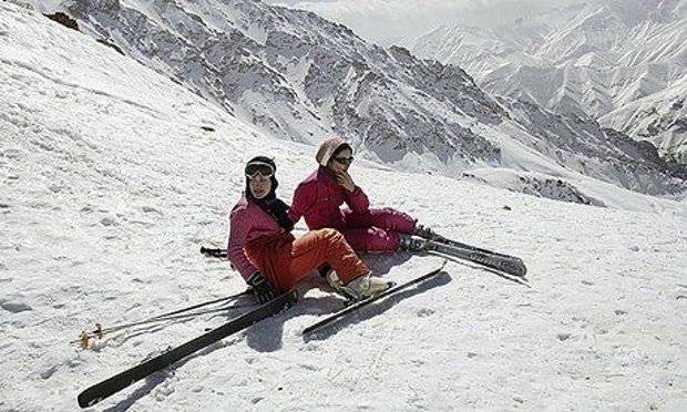 iranian girls take a break from skiing at shemshak near tehran shemshak is one of 18 winter sports resorts in iran photo reuters
