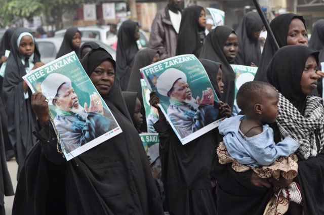 scores of nigerian shia muslims charged after army clashes