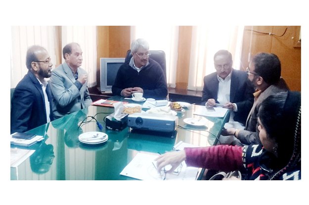 adviser to chief minister on health khwaja salman rafique holding a meeting with abdul bari chief recipient of global fund and the indus hospital karachi head photo nni