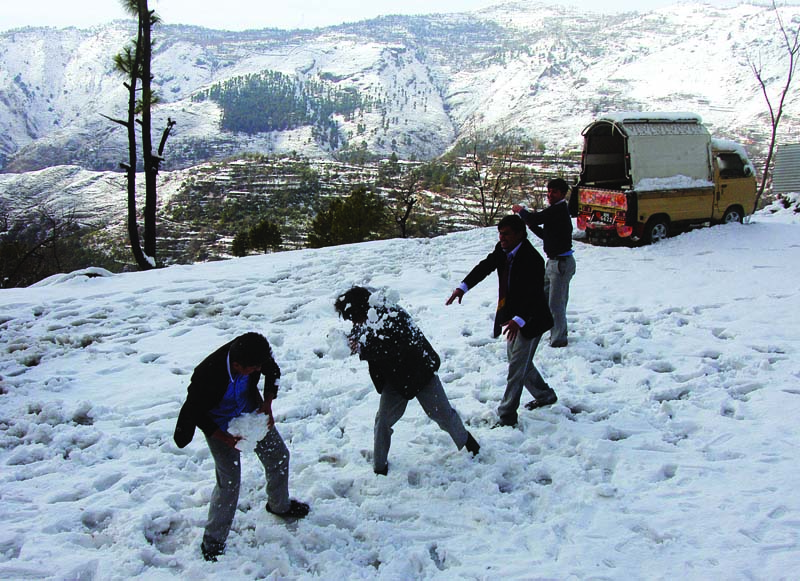 students frolic in the snow during school hours photos muhammad javaid amp waseem nazir