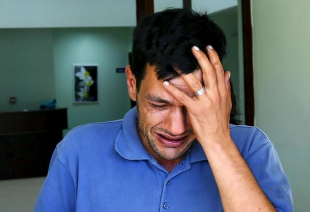 abdullah kurdi father of three year old aylan kurdi cries as he leaves a morgue in mugla turkey september 3 2015 photo afp