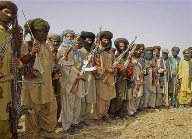an undated photo shows baloch rebels holding their weapons as they pose for a photograph at an undisclosed location in balochistan photo reuters