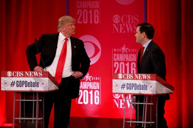 republican us presidential candidate donald trump l speaks with senator marco rubio during a commercial break at the republican us presidential candidates debate sponsored by cbs news and the republican national committee in greenville south carolina february 13 2016 photo reuters