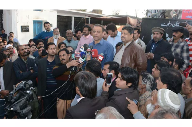 pti leader aleem khan addressing the participants of the protest photo express pti leader aleem khan addressing the participants of the protest photo express