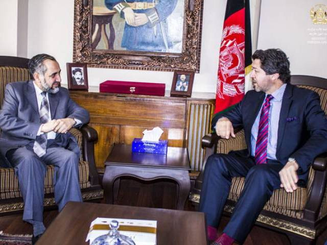 this picture released by afghan foreign ministry shows pakistan ambassador in kabul abrar hussain l meeting with afghan deputy foreign minister hekmat khalil karzai r in kabul on february 14 2016
