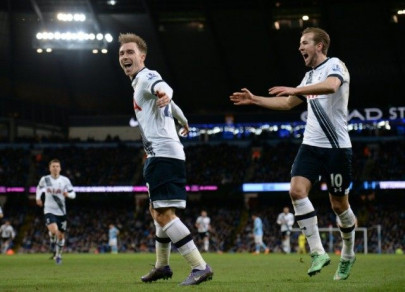 birthday boy eriksen ignites spurs title bid
