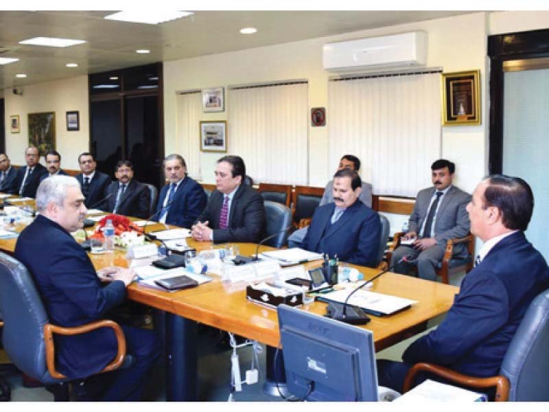 nab chairman qamar zaman chaudhry addresses participants of the meeting at nab headquarters photo express