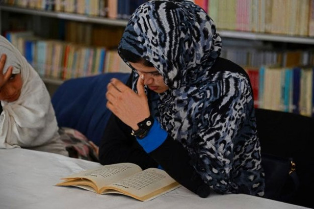 single women and housewives swaddled in brightly coloured headscarves come together in a basement room for the poetry reading some of them risking punishment or even death if discovered photo afp single women and housewives swaddled in brightly coloured headscarves come together in a basement room for the poetry reading some of them risking punishment or even death if discovered photo afp