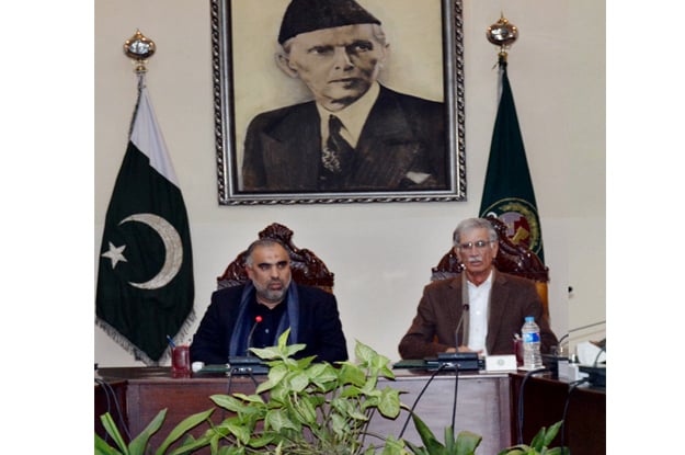 acting k p governor asad qaiser presiding over a high level meeting regarding law and order situation photo express