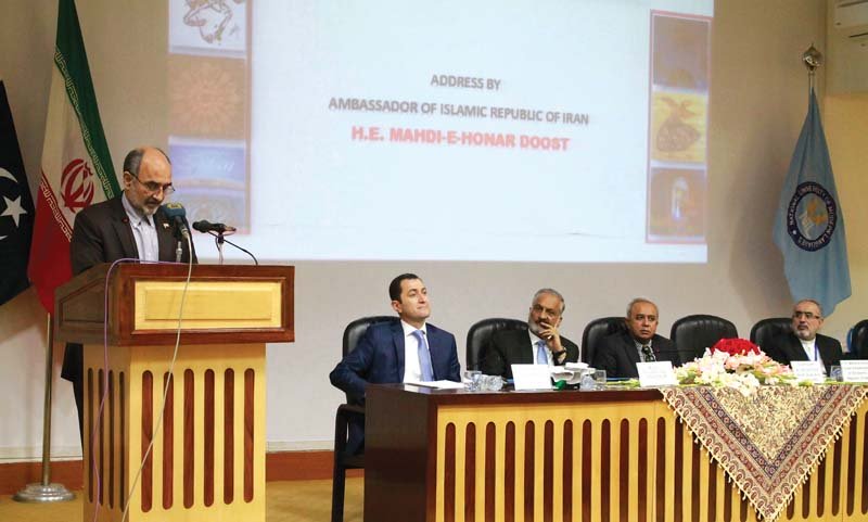 the iranian ambassador mehdi i honar doost addresses inaugural session on cultural and lingual commonalities between iran and pakistan at numl on wednesday photo express