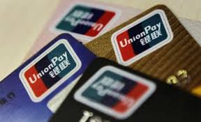 logos of china unionpay are seen on bank cards in this photo illustration taken in beijing photo reuters