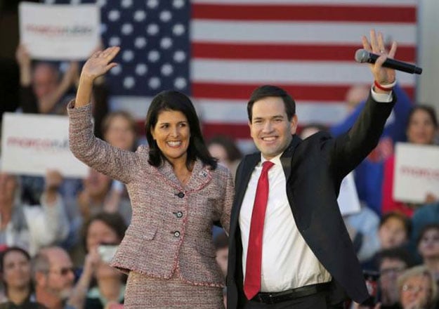 south carolina governor nikki haley l and us republican presidential candidate marco rubio react on stage during a campaign event in chapin south carolina february 17 2016 photo reuters