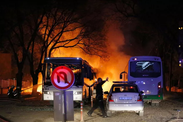 a police officer gestures as he walks at the site of an explosion while firefighters try to extinguish flames after an attack targeted a convoy of military service vehicles in ankara on february 17 2016 at least 18 people were killed and 45 wounded by a car bomb targeting the military in the heart of the turkish capital ankara on february 17 the city 039 s governor said the bloodshed came on the heels of a string of attacks in turkey blamed on militants but also on kurdish rebels the bomb aimed at a convoy of military service vehicles photo reuters a police officer gestures as he walks at the site of an explosion while firefighters try to extinguish flames after an attack targeted a convoy of military service vehicles in ankara on february 17 2016 at least 18 people were killed and 45 wounded by a car bomb targeting the military in the heart of the turkish capital ankara on february 17 the city 039 s governor said the bloodshed came on the heels of a string of attacks in turkey blamed on militants but also on kurdish rebels the bomb aimed at a convoy of military service vehicles photo reuters
