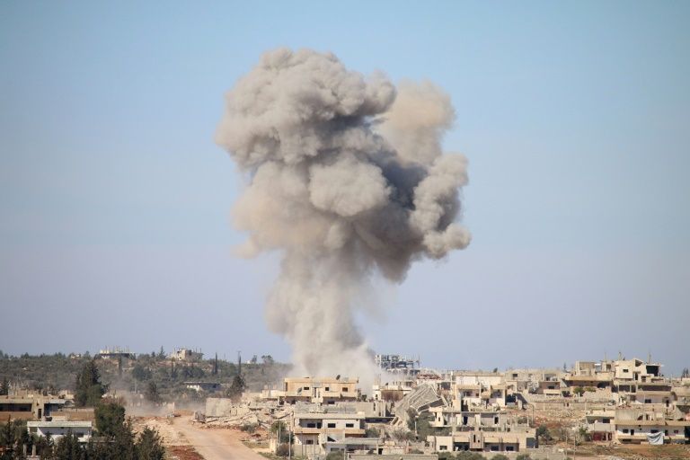 smoke billows following reported air strikes by syrian government forces in a rebel held area of daraa in southern syria on february 17 2016 photo afp