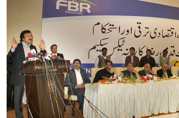 prime minister s special assistant on revenue haroon akhtar khan speaking at a seminar organised by traders and the federal board of revenue photo express