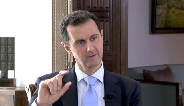 syrian president bashar al assad speaks during a tv interview in damascus syria in this still image taken from a video on november 29 2015 photo reuters