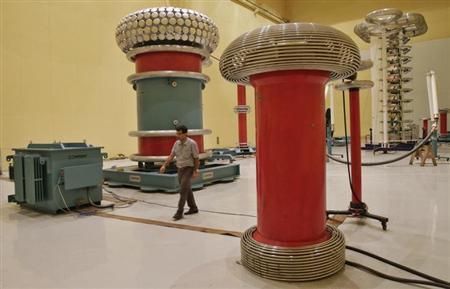 an employee walks inside the power cable testing laboratory for insulation at the kei industries one of india 039 s leading electrical equipment manufacturers at the industrial estate of bhiwadi in rajasthan august 6 2012 photo reuters