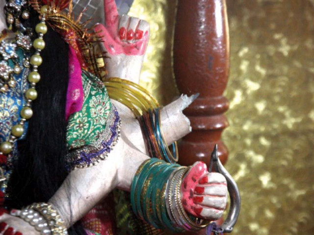 the pandit of the shital mata temple claims the police did not allow him to register an fir against the desecration of an idol at the temple and instead asked him to vacate the premises photo athar khan express