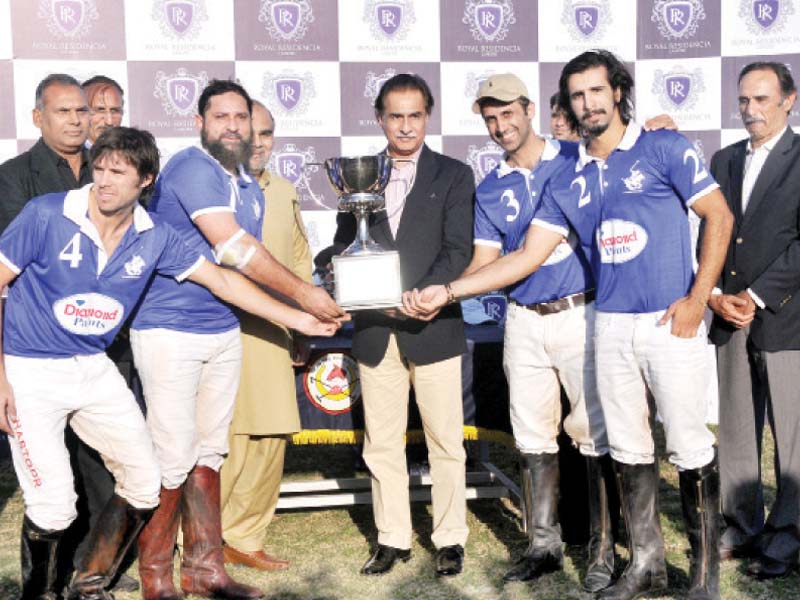 ayaz sadiq gives away a trophy to players photo pr