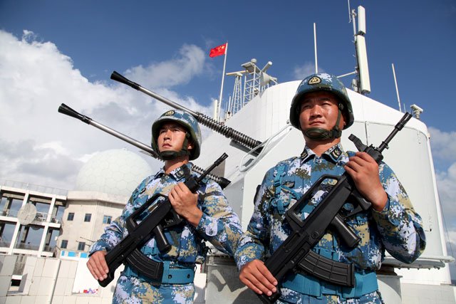 soldiers of china 039 s people 039 s liberation army pla navy stand guard in the spratly islands known in china as the nansha islands on february 10 2016 photo reuters