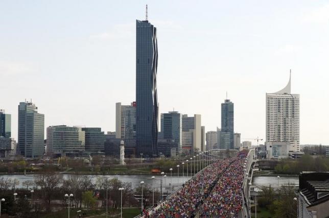 runners cross the river danube at reichsbruecke bridge minutes after the start of the vienna city marathon in vienna april 12 2015 photo reuters